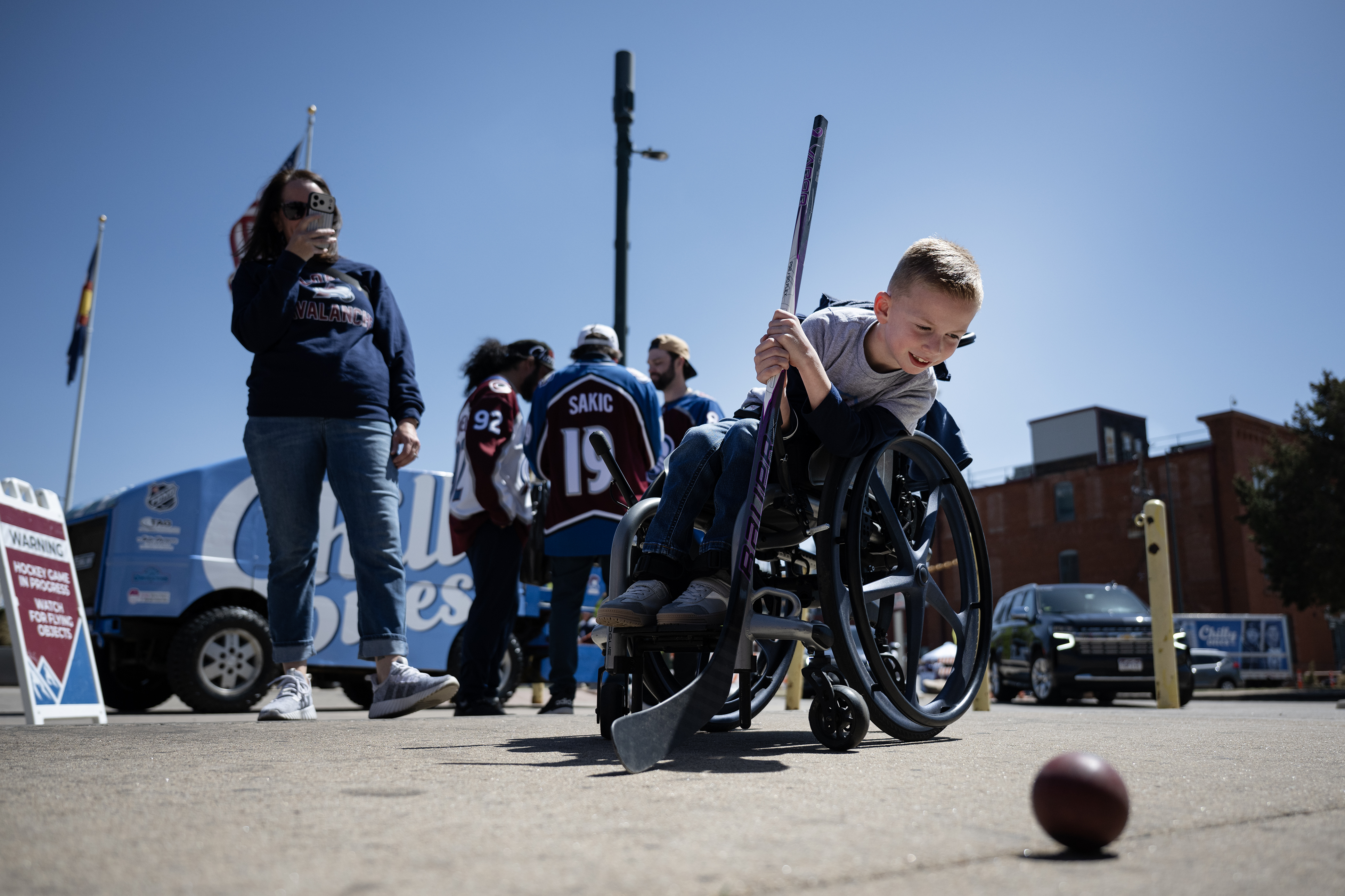 AJ Basley, 8, takes a shot at the goal at...