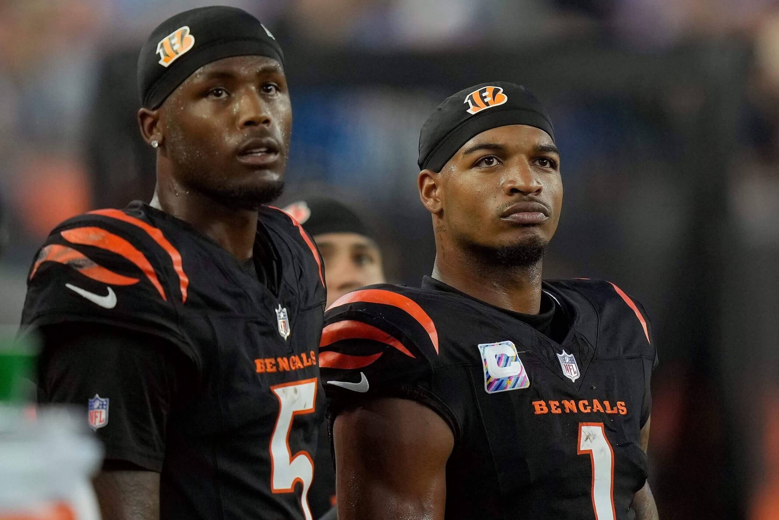 Cincinnati Bengals wide receiver Tee Higgins (5) and wide receiver Ja'Marr Chase (1) watch the score board as their team lose to the Detroit Lions 24-37 at Paycor Stadium on October 5, 2025.