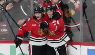 Apr 15, 2026; Chicago, Illinois, USA; Chicago Blackhawks center Ryan Greene (20) celebrates his goal against the San Jose Sharks with center Ryan Donato (8) during the third period at United Center. Mandatory Credit:
