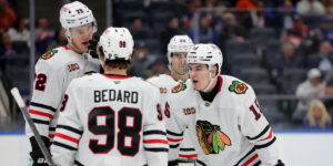 Connor Bedard, Anton Frondell, Alex Vlasic, and Ryan Greene Huddle pre faceoff