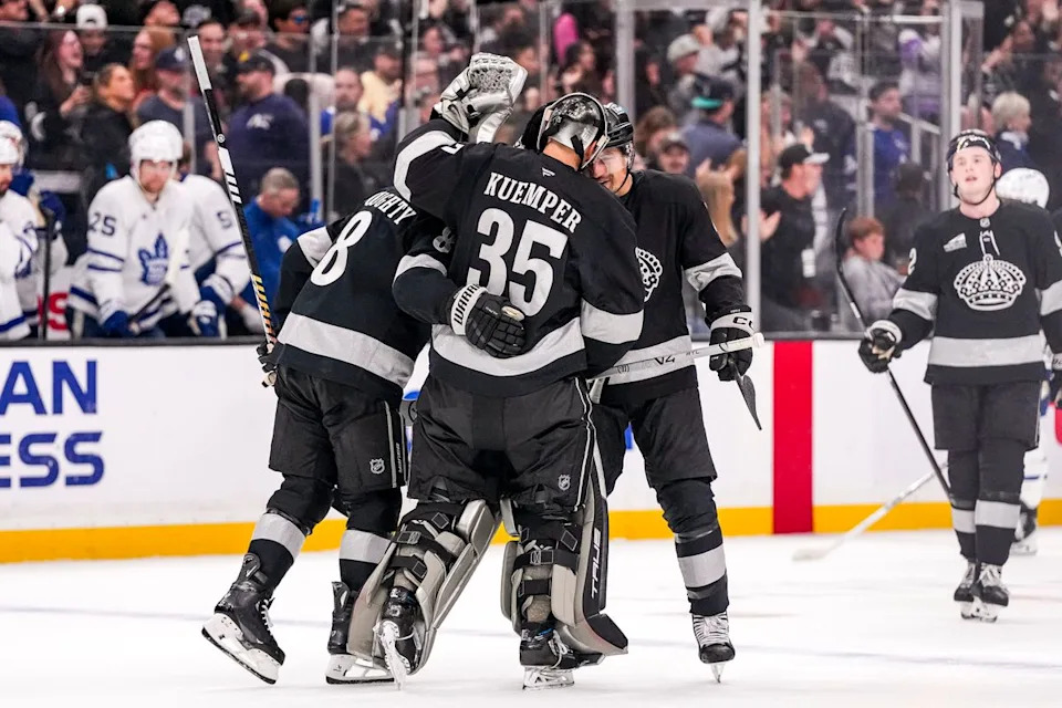 Los Angeles Kings players celebrating winning in overtime during an NHL hockey game against the Toronto Maple Leafs on April 4th, 2026 in Los Angeles, CA.
