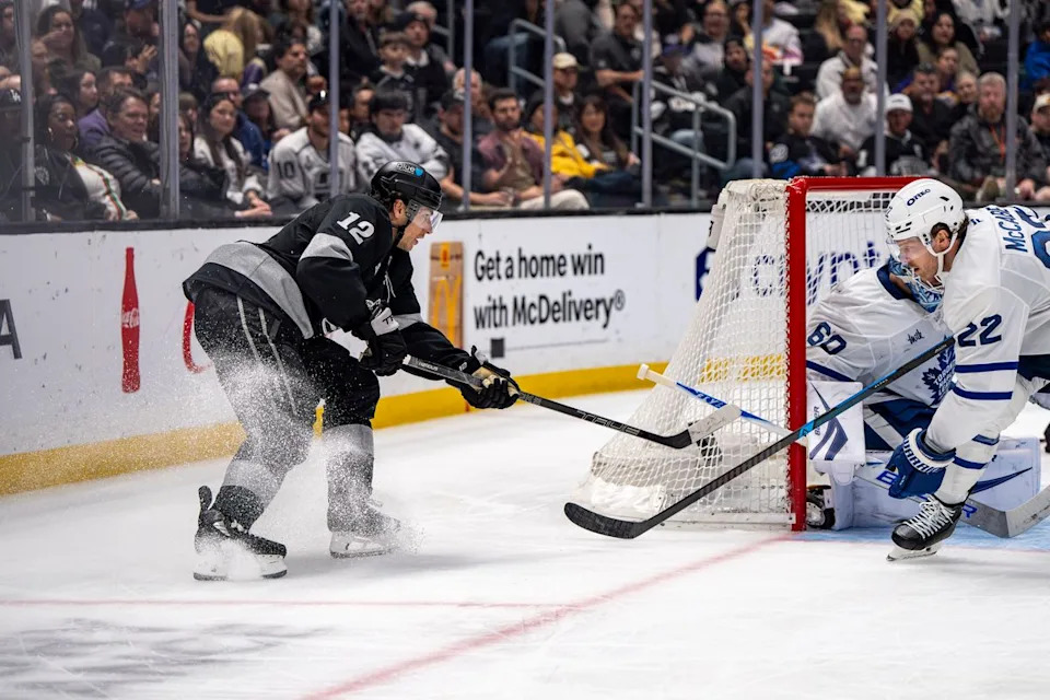 Los Angeles Kings left wing Trevor Moore (12) attempting a goal during an NHL hockey game against the Toronto Maple Leafs on April 4th, 2026 in Los Angeles, CA.