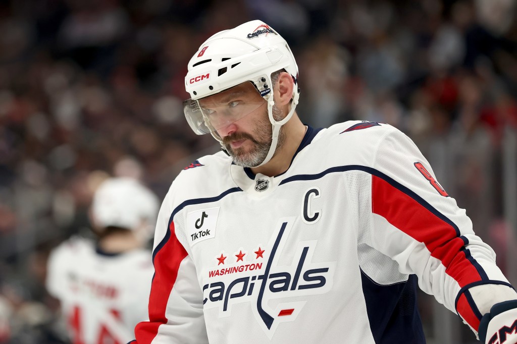 Alex Ovechkin of the Washington Capitals wearing his hockey helmet and jersey.