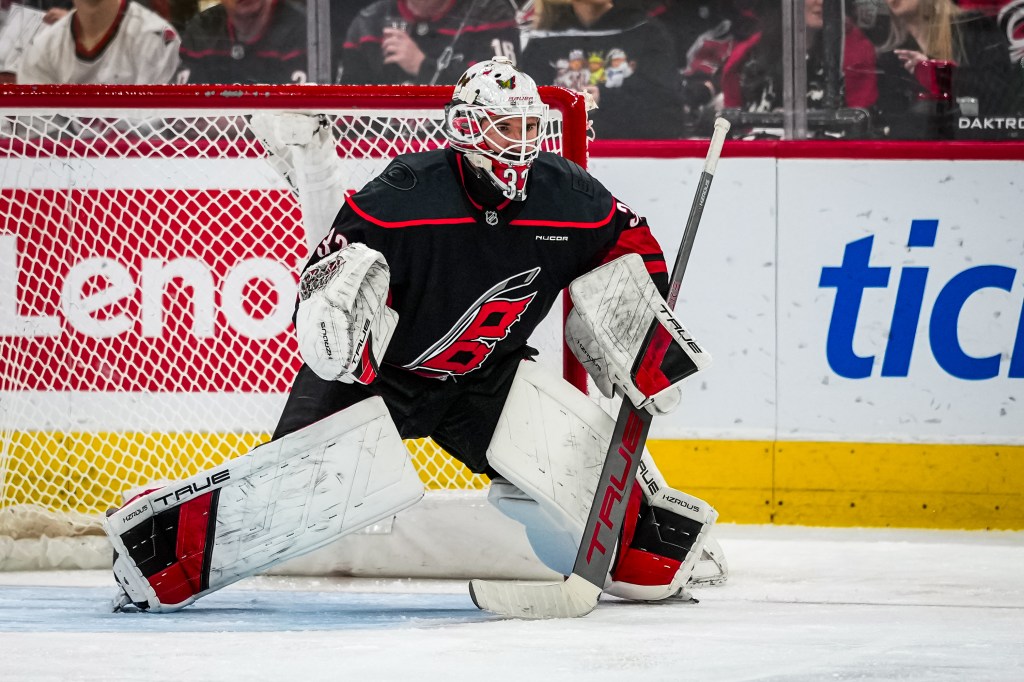 Brandon Bussi #32 of the Carolina Hurricanes tends net.