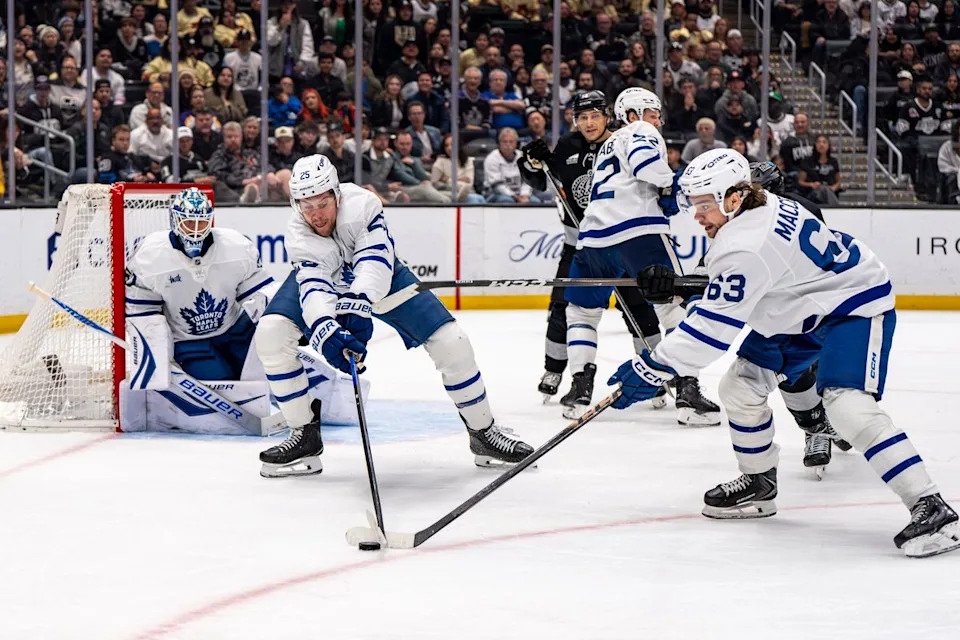 Toronto Maple Leafs defenseman Brandon Carlo (25) retrieving the puck after a block during an NHL hockey game against the Los Angeles Kings on April 4th, 2026 in Los Angeles, CA.