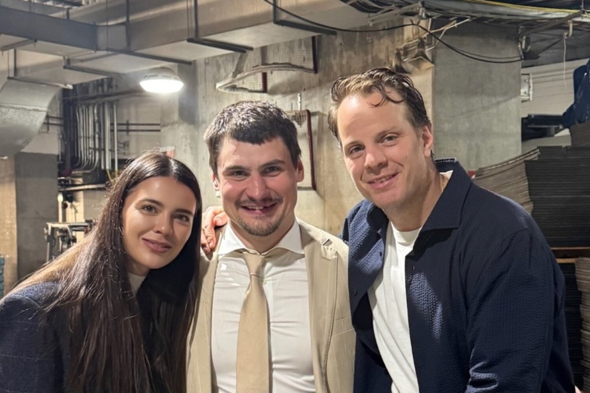 John Carlson meets up with former Capitals teammate Dmitry Orlov after Ducks-Sharks game