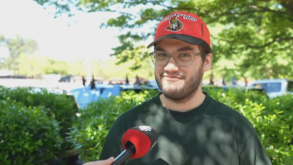 Senators fan Dominic Patafie takes part in a tailgate party ahead of the first playoff game against the Carolina Hurricanes in Raleigh, North Carolina.