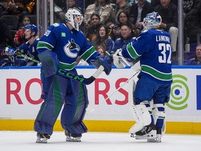 Vancouver Canucks goalie Nikita Tolopilo (60) comes into the game in relief of goalie Kevin Lankinen (32) against the San Jose Sharks at Rogers Arena on Tuesday, January 27, 2026.