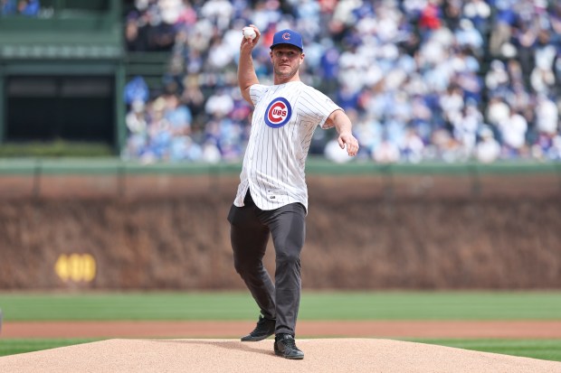 Former Chicago Blackhawks player Jonathan Toews throws out the first pitch before a game between the Chicago Cubs and the Washington Nationals at Wrigley Field on Sunday, March 29, 2026. (AP Photo/Geoff Stellfox)