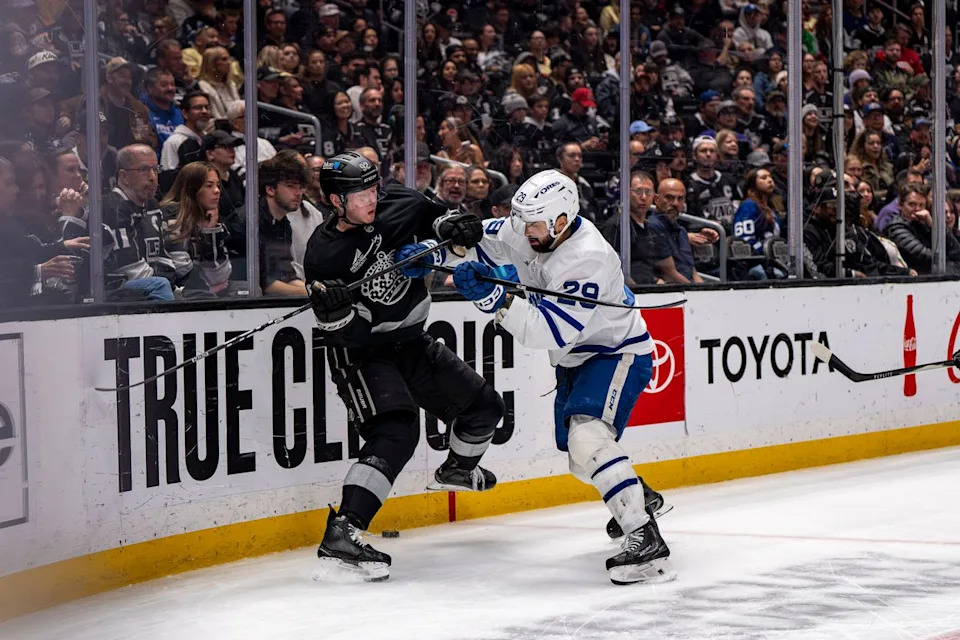 Los Angeles Kings defenseman Brandt Clarke (92) fighting Bo Groulx during an NHL hockey game against the Toronto Maple Leafs on April 4th, 2026 in Los Angeles, CA.