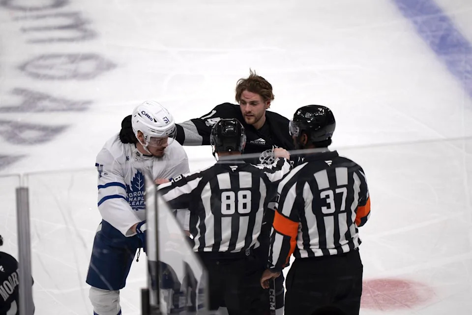 Los Angeles Kings right wing Alex Laferriere (14) punches the back of the head of an opponent during an NHL hockey game against the Toronto Maple Leafs on April 4th, 2026 in Los Angeles, CA.