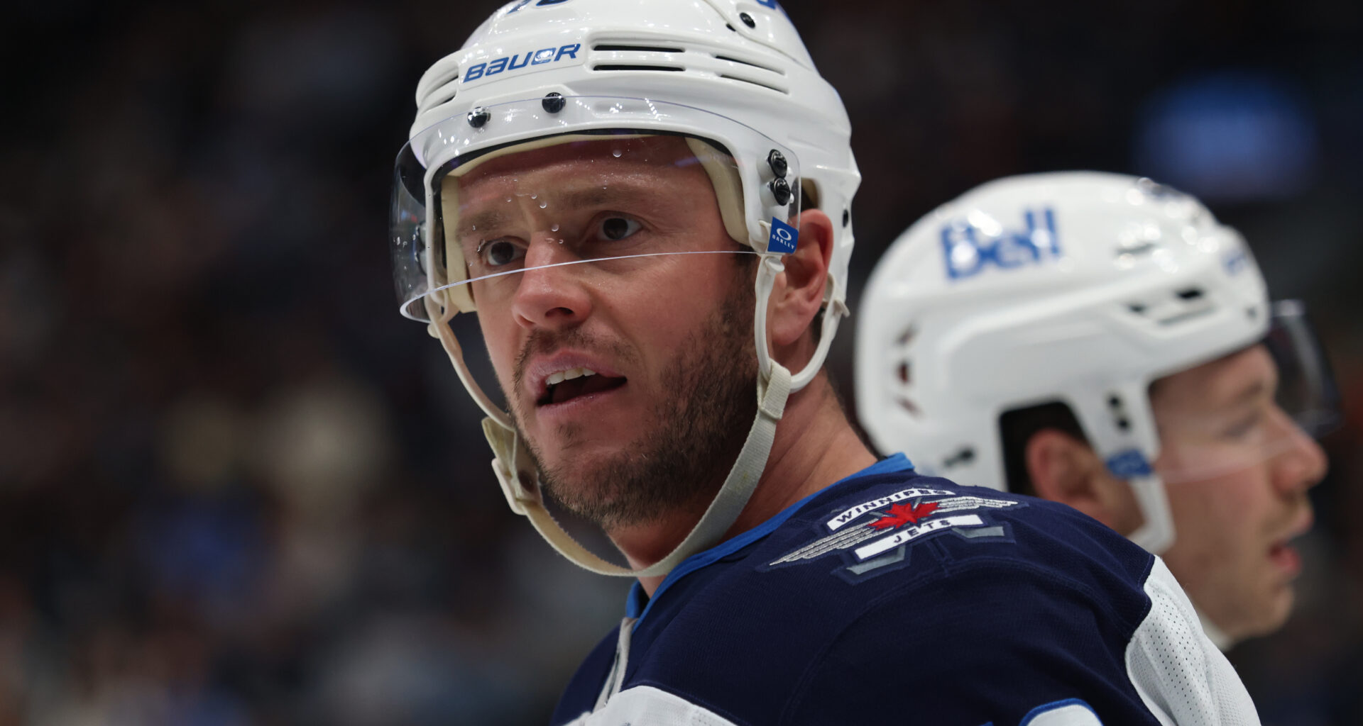 Winnipeg Jets center Jonathan Toews (19) reacts after a play at Delta Center.