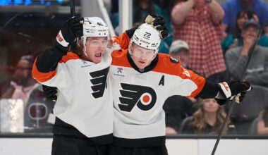 Philadelphia Flyers center Christian Dvorak (22) celebrates with center Trevor Zegras (46) at SAP Center at San Jose.