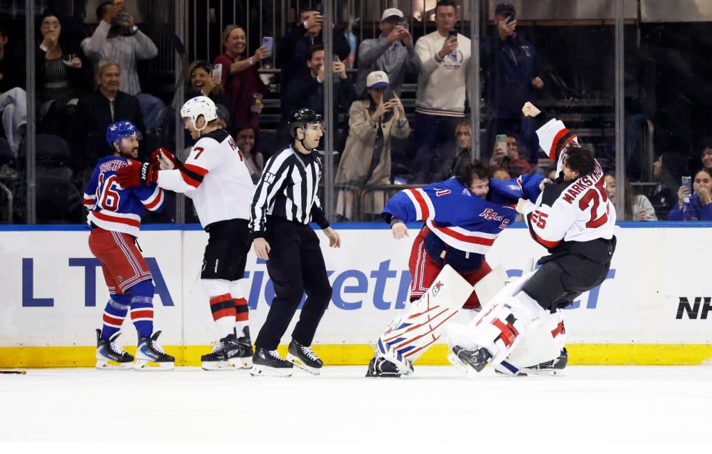 Goaltender Igor Shesterkin #31 of the New York Rangers and goaltender Jacob Markstrom #25 of the New Jersey Devils get into a scuffle during the third period at Madison Square Garden, Tuesday, March 31, 2026. Jason Szenes for the New York Post