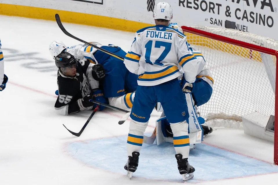 Los Angeles Kings Right Wing Quinton Byfield (55) gets taken out and landed on during an NHL match against the St. Louis Blues on April 1st, 2026 in Los Angeles, California.