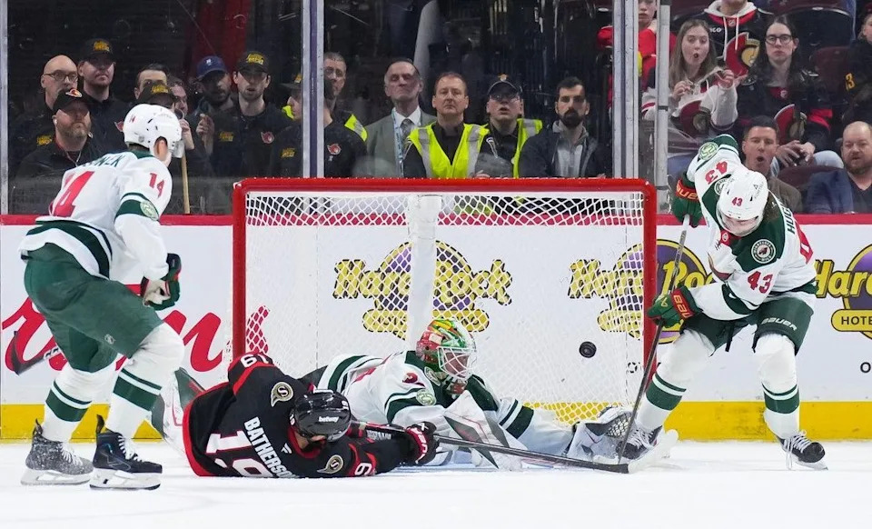  Drake Batherson (19) scores the only Senators goal of the game against Jesper Wallstedt of the Wild late in the third period.