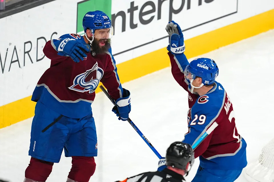 Burns celebrating with Nathan MacKinnon. Credit: Stephen R. Sylvanie