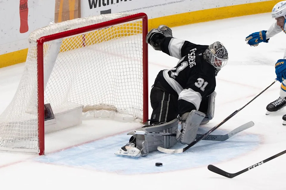 Los Angeles Kings Goalie Anton Forsberg (31) makes his opponent miss the shot attempt during an NHL match against the St. Louis Blues on April 1st, 2026 in Los Angeles, California.