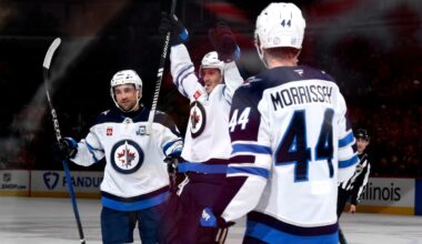 Jets recover to defeat Blackhawks in OT, move 1 point back of wild-card spot