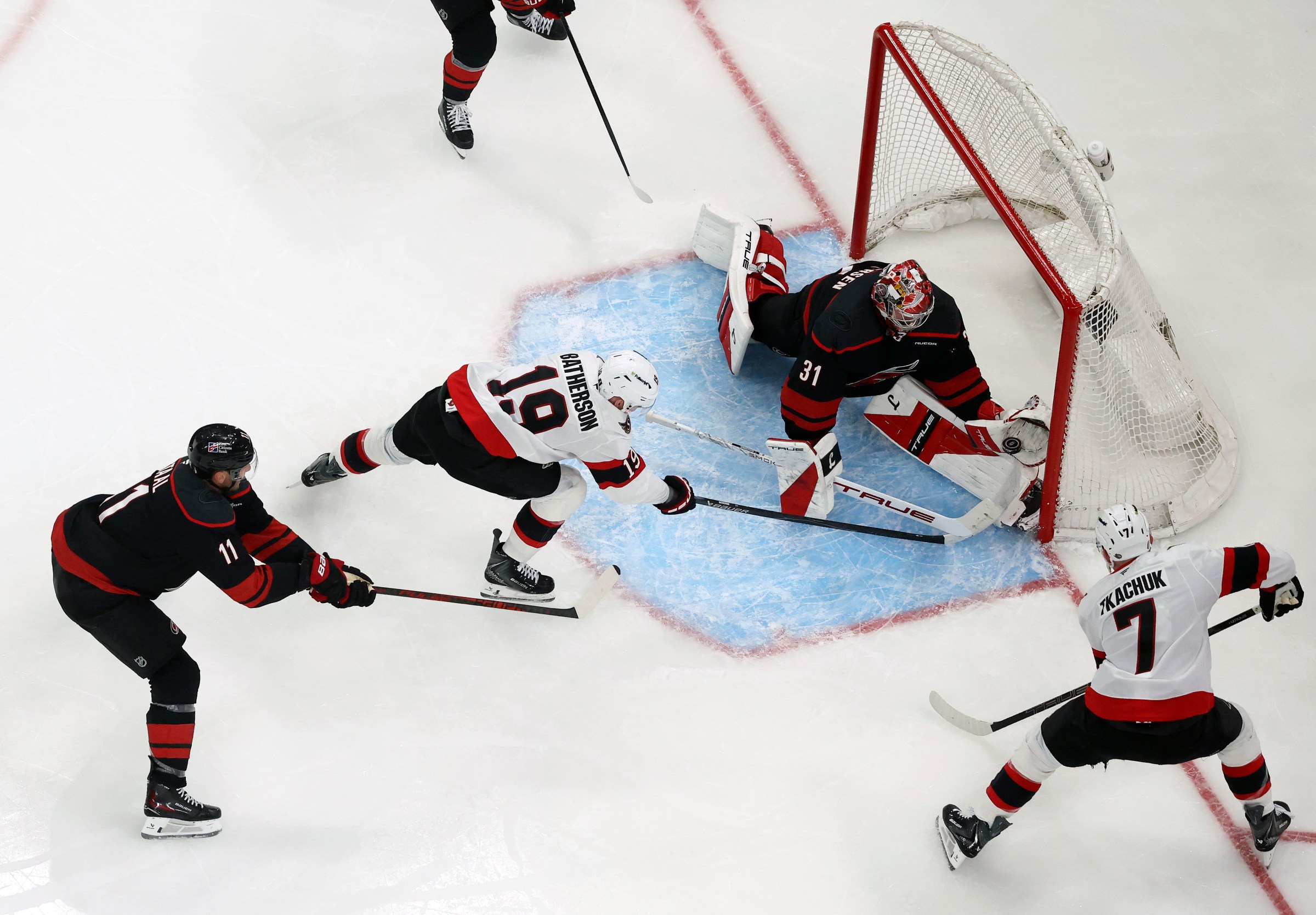 RALEIGH, NORTH CAROLINA - APRIL 18: Frederik Andersen #31 of the Carolina Hurricanes makes a save against Drake Batherson #19 of the Ottawa Senators during the third period of the game at Lenovo Center on April 18, 2026 in Raleigh, North Carolina. (Photo by Jared C. Tilton/Getty Images)