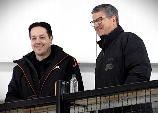 NHL Flyers brass overlooking the team at practice