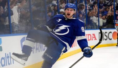Tampa Bay Lightning defenseman J.J. Moser (90) celebrates after scoring the game-winning goal against the Montréal Canadiens during overtime in Game 2 of an NHL hockey Stanley Cup first-round playoff series, Tuesday, April 21, 2026, in Tampa, Fla. (AP Photo/Chris O'Meara)