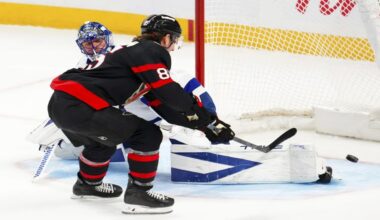 Ottawa Senators' Jake Sanderson (85) scores on Tampa Bay Lightning goaltender Jonas Johansson (31) during the third period of an NHL hockey game in Ottawa, Ontario, on Tuesday, April 7, 2026. (Sean Kilpatrick/The Canadian Press via AP)