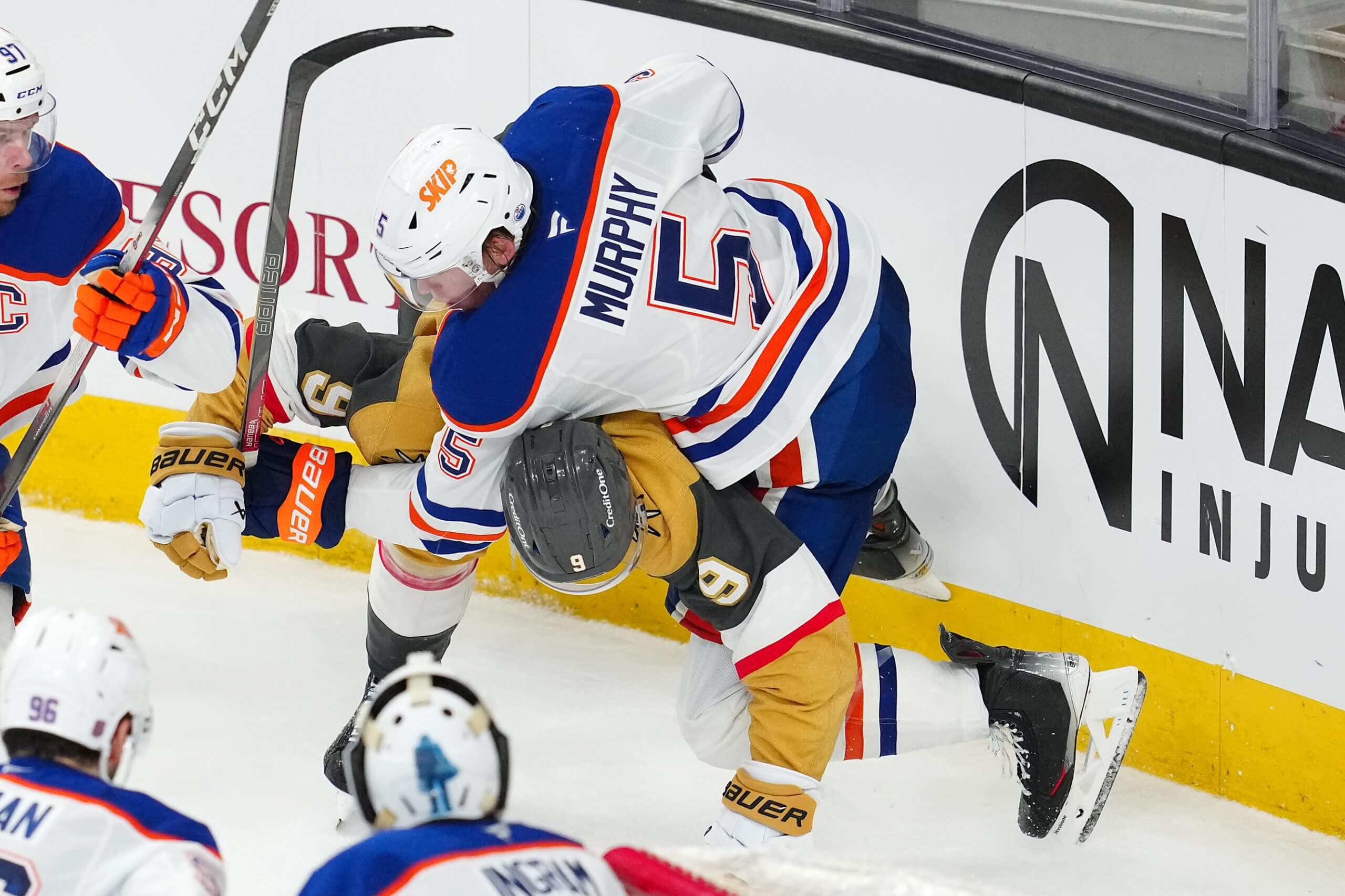 Edmonton Oilers defenseman Connor Murphy takes down Vegas Golden Knights center Jack Eichel during the third period at T-Mobile Arena. 