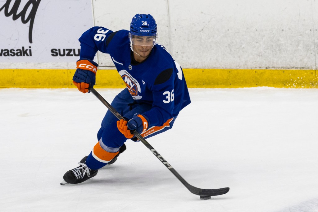 New York Islanders defenseman Isaiah George (36) skates during practice.