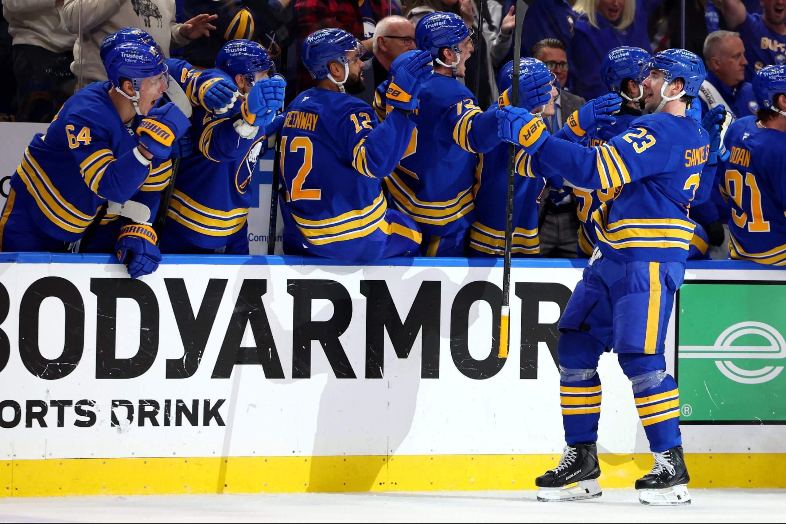 Buffalo Sabres defenseman Mattias Samuelsson celebrates his goal with teammates during the third period against the Boston Bruins in game one of the first round of the Stanley Cup Playoffs at KeyBank Center on April 19, 2026, in Buffalo, N.Y.