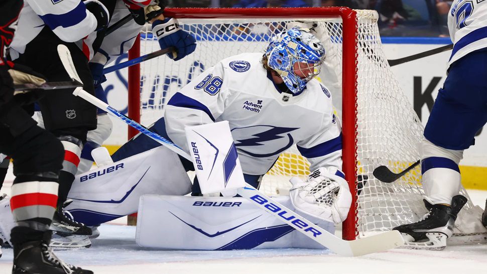 Tampa Bay Lightning goaltender Andrei Vasilevskiy (88) looks for the puck in traffic during the first period of an NHL hockey game against the Buffalo Sabres, Monday, April 6, 2026, in Buffalo, N.Y. (AP Photo/Jeffrey T. Barnes)