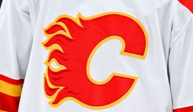 Dec 12, 2022; Montreal, Quebec, CAN; View of a Calgary Flames logo on a jersey worn by the member of the team during the second period at Bell Centre. Mandatory Credit: David Kirouac-Imagn Images