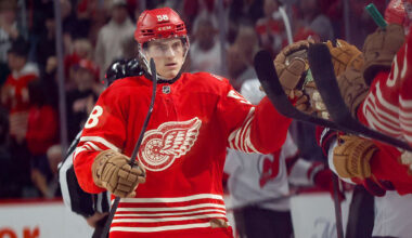 Apr 11, 2026; Detroit, Michigan, USA;  Detroit Red Wings center Emmitt Finnie (58) receives congratulations from teammates after scoring in the third period against the New Jersey Devils at Little Caesars Arena. Mandatory Credit: Rick Osentoski-Imagn Images