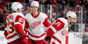 Mo Seider Lucas Raymond Dylan Larkin of the Detroit Red Wings