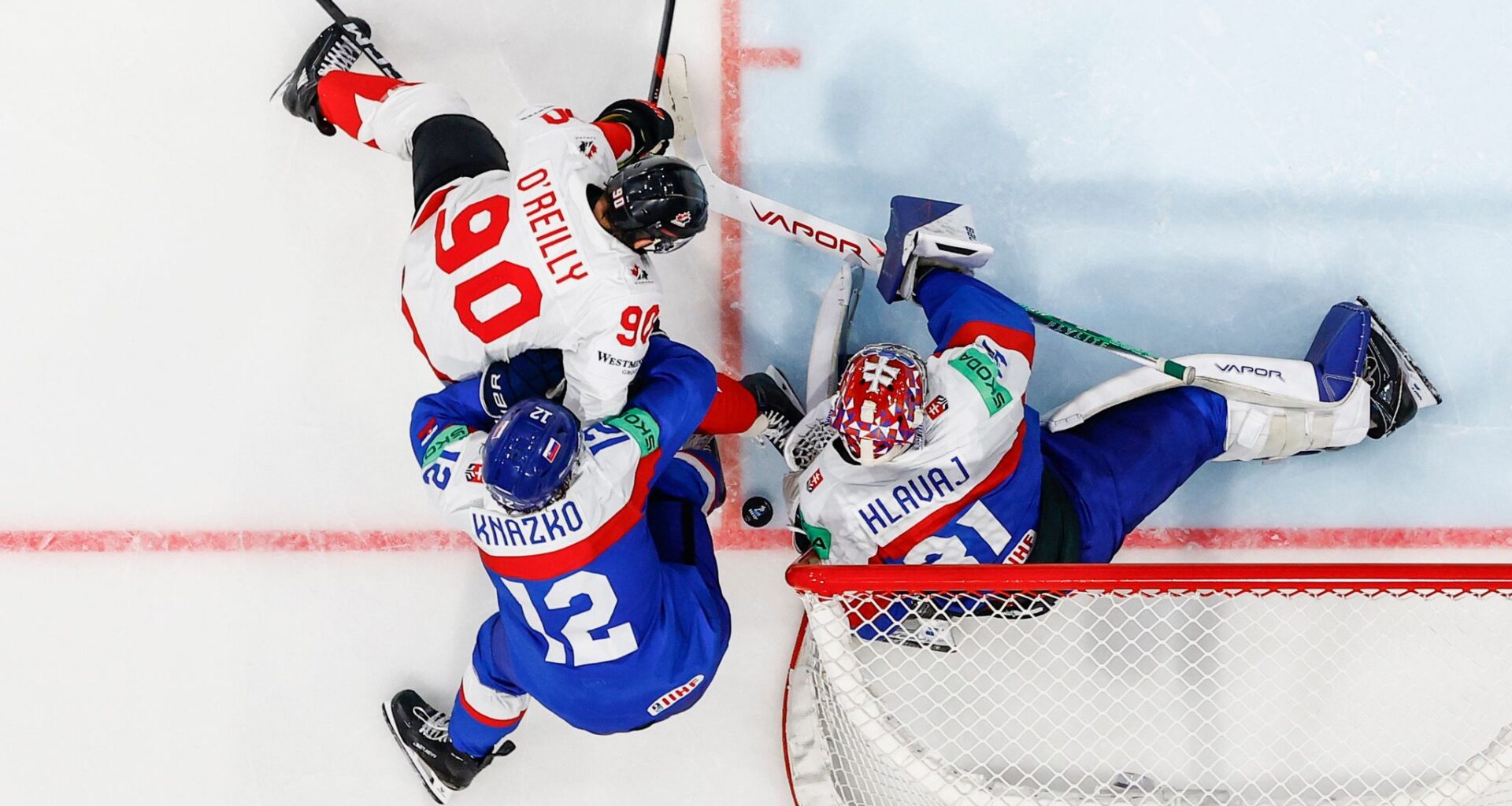 Canada scores 4 in the final period to beat Slovakia 5-1 at ice hockey worlds