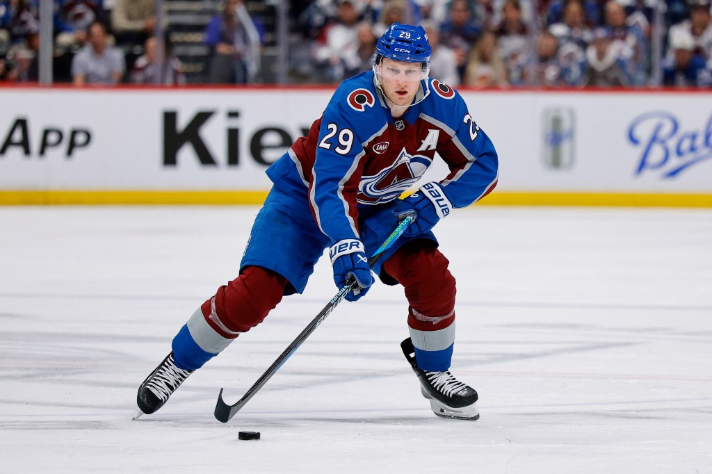 Apr 21, 2026; Denver, Colorado, USA; Colorado Avalanche center Nathan MacKinnon (29) controls the puck in the second period against the Los Angeles Kings in game two of the first round of the 2026 Stanley Cup Playoffs at Ball Arena. Mandatory Credit: Isaiah J. Downing-Imagn Images