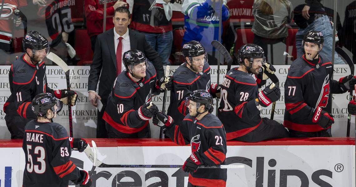 Carolina Hurricanes center Logan Stankoven (22) scores on Philadelphia goalie Dan Vladar (80) to take a 3-0 lead in the second period of Game 1 on Saturday, May 2, 2026, during the second round of the Stanley Cup Playoffs at Lenovo Center in Raleigh.