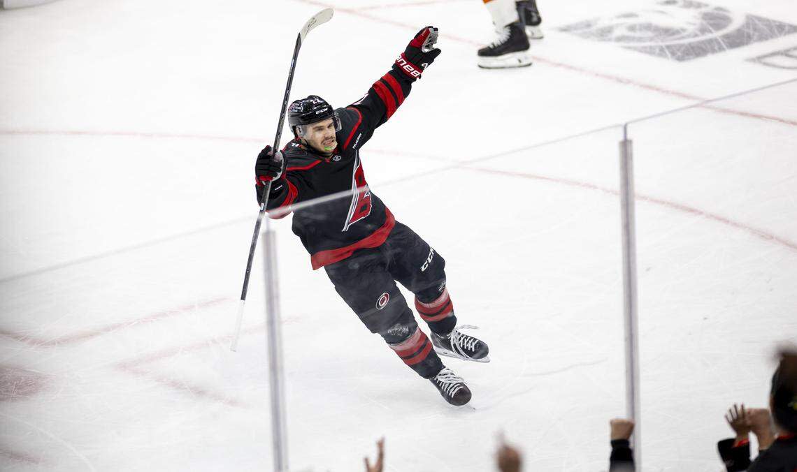 Carolina Hurricanes center Logan Stankoven (22) reacts after scoring to take a 3-0 lead over Philadelphia in the second period of Game 1 on Saturday, May 2, 2026, during the second round of the Stanley Cup Playoffs at Lenovo Center in Raleigh, N.C.