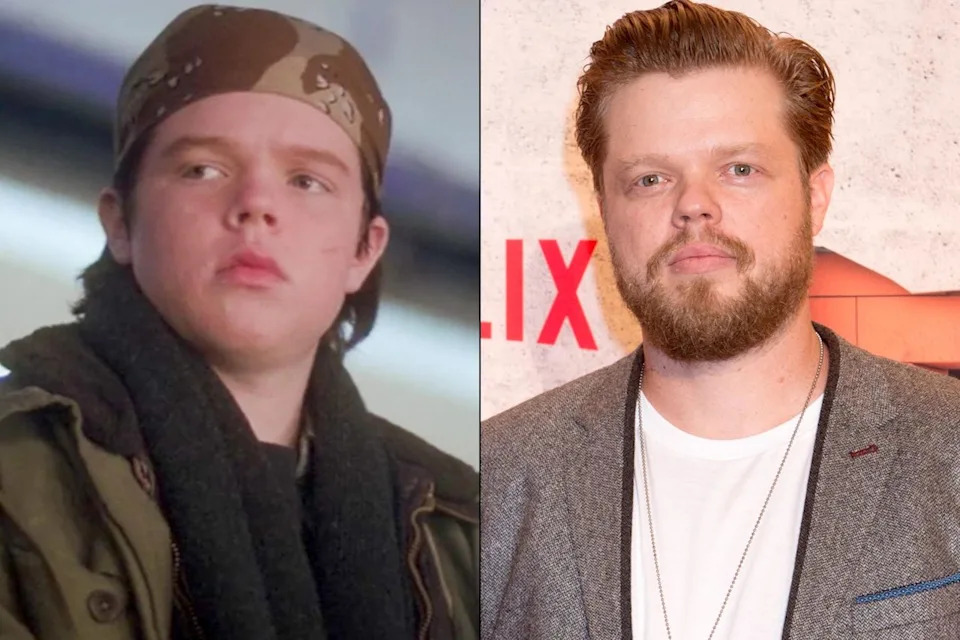 Elden Henson as Fulton Reed in 'The Mighty Ducks'; Elden Henson arrives for the Netflix premiere of Marvel's 'The Defenders' on July 31, 2017, in New YorkCredit: Disney; Bryan R. Smith/AFP/Getty Images