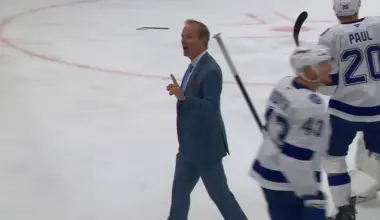 Photo of Tampa Bay Lightning head coach Jon Cooper taunting Canadiens fans.