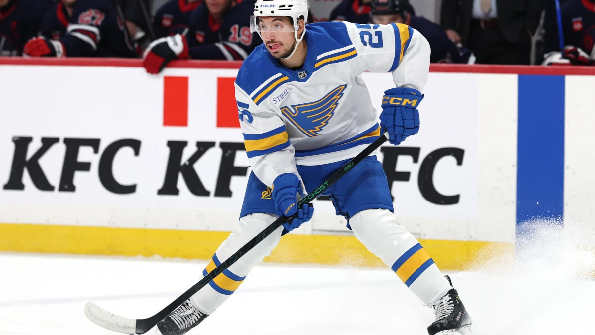 St. Louis Blues right wing Jordan Kyrou (25) skates with the puck during a game against the Winnipeg Jets in the second period at Canada Life Centre.