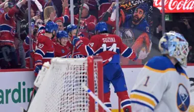 Montreal Canadiens forward Cole Caufield (13) celebrates with teammates forward Juraj Slafkovsky (20) and forward Ivan Demidov (93) and forward Nick Suzuki (14) after scoring a goal against Buffalo Sabres goalie Ukko-Pekka Luukkonen (1) during the first period in game four of the second round of the 2026 Stanley Cup Playoffs at Bell Centre.