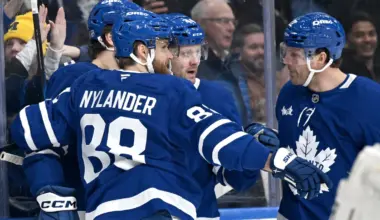 Toronto Maple Leafs defenseman Morgan Rielly (44) celebrates with team mates after scoring a goal against the Ottawa Senators in the first period at Scotiabank Arena.