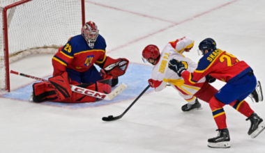 China edges Romania for first win at men's ice hockey World Championship