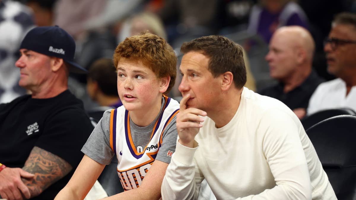 Phoenix Suns owner Mat Ishbia (right) with his son.Mark J&period; Rebilas-Imagn Images
