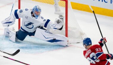 Tampa Bay Lightning goaltender Andrei Vasilevskiy (88) stops a shot by Montreal Canadiens' Ivan Demidov (93) during the second period of Game 6 in the first round of an NHL hockey Stanley Cup playoff series in Montreal, Friday, May 1, 2026. (Christinne Muschi/The Canadian Press via AP)