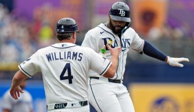 Tampa Bay Rays' Junior Caminero celebrates his solo home run with third base coach Brady Williams (4) during the first inning of a baseball game Sunday, May 17, 2026, in St. Petersburg, Fla. (AP Photo/Chris O'Meara)