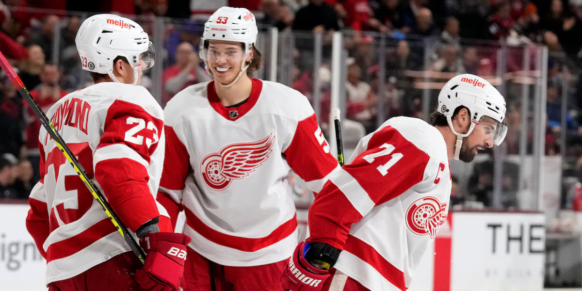 Mo Seider Lucas Raymond Dylan Larkin of the Detroit Red Wings