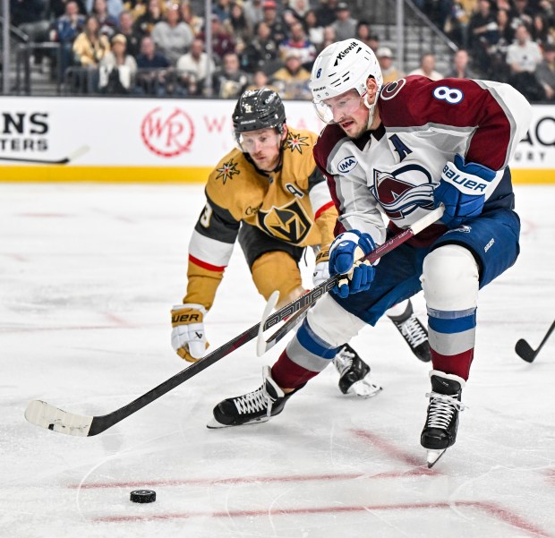 Cale Makar (8) of the Colorado Avalanche skates as Jack Eichel (9) of the Vegas Golden Knights defends during the third period of the Golden Knights' 5-3 win in Game 3 of the NHL Western Conference Final at T-Mobile Arena in Las Vegas, Nevada on Sunday, May 24, 2026. Vegas now leads the series 3-0. (Photo by AAron Ontiveroz/The Denver Post)