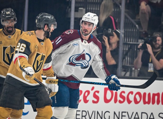 Brock Nelson (11) of the Colorado Avalanche jaws with Nic Dowd (26) of the Vegas Golden Knights during the first period of Game 3 of the NHL Western Conference Final at T-Mobile Arena in Las Vegas, Nevada on Sunday, May 24, 2026. (Photo by AAron Ontiveroz/The Denver Post)